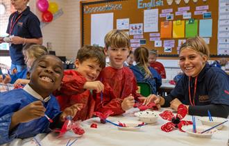 Children at Cranbrook Primary School making poppies