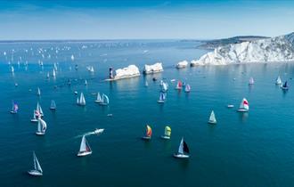 Yachts passing the Needles in the Round the Island Race, Isle of Wight, What's On - Image credit: Paul Wyeth