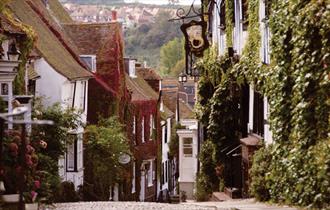 Mermaid Street in Rye town showing cobbles, pubs and timber-framed houses