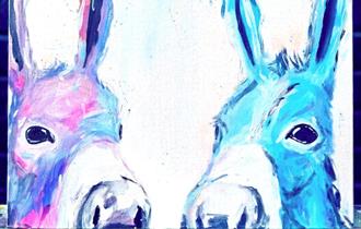 Painting of two donkeys just in the canvas frame in a watercolour style mostly in purples and blues