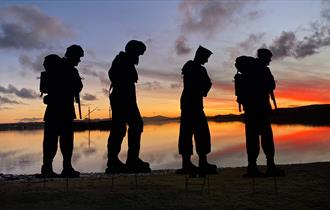 Four silhouettes from the Standing With Giants Falklands exhibition