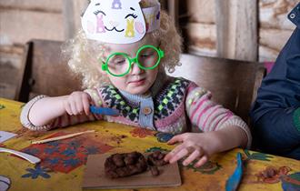 Child taking part in craft activities