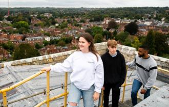 Group of friends doing Winchester Cathedral Tower Tour