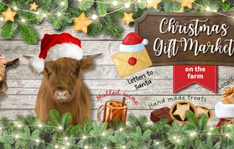 Wooden background with text, a goat and hughland cow wearing santa hats