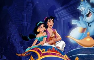 Aladdin movie poster. Jasmine and Aladdin on the moving carpet looking at the Genie.