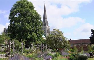 View of Chichester Cathedral in Bishop's Palace Gardens
