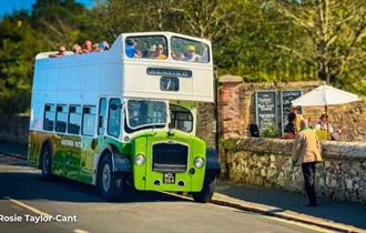 Vintage bus driving along with passengers, Wightrider, Isle of Wight Bus & Coach Museum, Ryde, classic buses, what's on, event - image credit: Rosie T