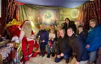 large family meeting farmer christmas