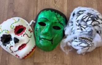Row of halloween masks made