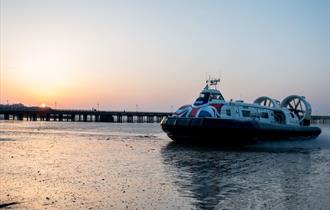 Hovercraft at Sunset coming into Ryde