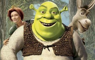 Shrek movie poster. Shrek, Donkey and Fiona looking at the camera.