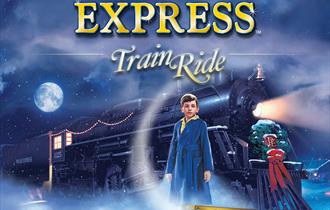 Official artwork of hero boy stood next to the polar express train