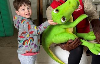 Boy meets dinosaur squeak