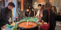 Team Activity Group - Casino night with roulette wheel.