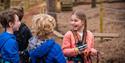Children having fun at Black Park Go Ape in Wexham right on the border of Slough, Berkshire