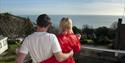 Couple enjoying view from Rocklands Holiday Apartments, East sussex