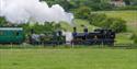 Isle of Wight Steam railway, Winter Gala and Dark Ales Festival, image of two engines on travelling along fields
