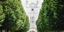 View through tower arch from garden