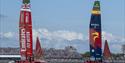 Two catamarans racing at Portsmouth Sail GP