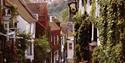 Mermaid Street in Rye town showing cobbles, pubs and timber-framed houses