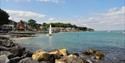 Yacht sailing in the distance at Seagrove Bay beach, Isle of Wight, Things to Do