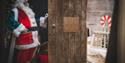 Father Christmas opening a door, Christmas at Tapnell Farm Park, What's On