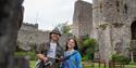 Visitors enjoying exploring Lewes Castle and grounds in Lewes, East Sussex