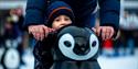 Child with a penguin-shaped skate aid at Ice Skate Portsmouth - credit Ice Skate Portsmouth and Vernon Nash