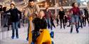 Family with a banana-shaped skate aid - credit Ice Skate Portsmouth and Vernon Nash