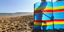 Girl with bucket and spade on Yaverland Beach, Sandown, Isle of Wight, Things to Do