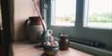 windowsill with vintage pottery
