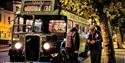 Passenger talking with the driver next to the vintage bus at night time, Wightrider, Isle of Wight Bus & Coach Museum, Ryde, classic buses, what's on