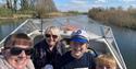 Family in a boat on the river - Cotswold Boat Hire