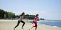 Girls running on Appley beach, Ryde, Isle of Wight, Things to Do