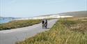 Group of cyclists riding along the Military Road on the Isle of Wight, Joyride Festival, cycling, wellness, health & wellbeing, food, music, what's on