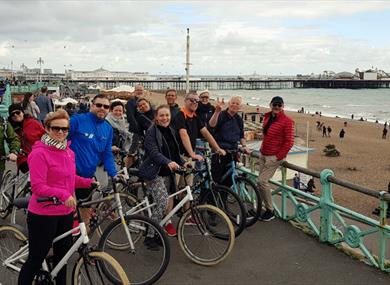 Group of cyclist on seafront