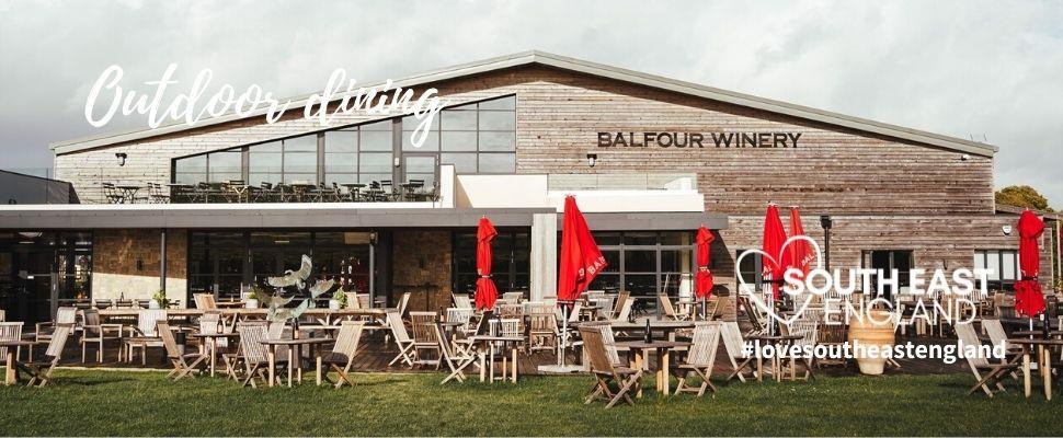 Enjoy alfresco dining on the large outside terrace at Balfour Winery with views across the vines.  Enjoy English wine and sharing platters and beautiful views over the Sussex countryside.