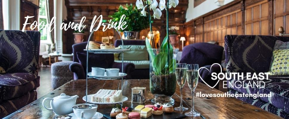 Enjoy a tasty afternoon tea in the historic Danesfield House Hotel, overlooking the River Thames. in Henley on Thames.