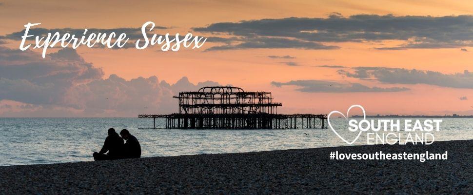 Sunset over Brighton West pier, an icon on Brighton beachfront, only a short walk from Brighton Palace pier, one of the many piers you can visit along the South Coast.