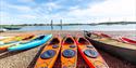 Kayaks at the entrance to Chichester Harbour, the calm waters make an ideal spot for heading out on the water.