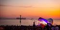 Victorious Festival's Seaside Stage at sunset