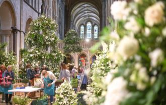 a view of floral arrangements in Chichester Cathedral