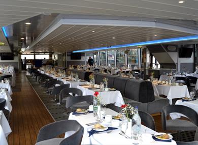 Interior of City Cruises boat set up for a wedding.