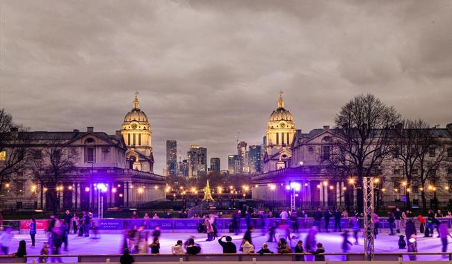 Queens House Ice Rink facing the Old Royal Naval College and Canary Wharf