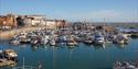 Boats moored up at Ramsgate Royal Harbour, Thanet, Kent Credit Thanet District Council