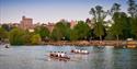 Rowers on the Thames with Windsor Castle in the background.