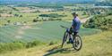 Summer cycling in West Sussex, view from South Downs National  Park.