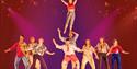 Isle of Wight, Things to do, Events, Ventnor Fringe image of acrobats on stage with one standing on anothers head