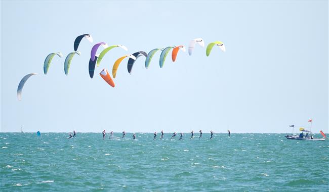 Kite surfing out in the Solent, photograph by Vernon Nash