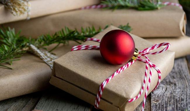 Presents and baubles on a wooden table, Christmas Fair at Northwood House, Isle of Wight, event, what's on, family fun, children activities, dog frien Presents and baubles on a wooden table, Christmas Fair at Northwood House, Isle of Wight, event, what's on, family fun, children activities, dog frien